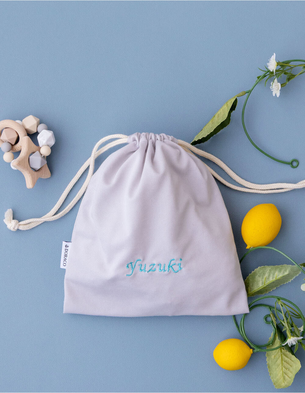 持ち運び 巾着袋 マルチポーチ 【刺繍可能商品】 DORACO FIRST