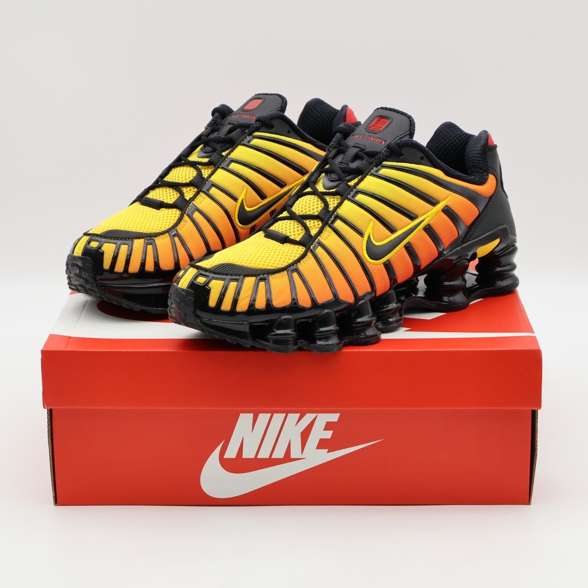 AV3595-004 Nike Shox TL Sunrise Black Amarillo University Red
