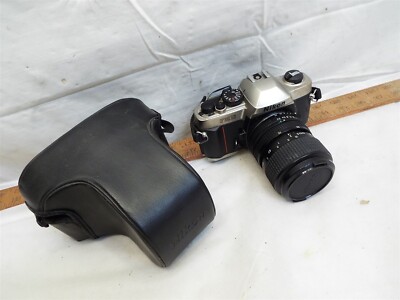Vintage Nikon FM10 35mm SLR Film Camera w/Case 35-70mm Zoom Lens