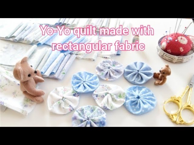 Yo-yo quilt made with square fabric1 Less waste than cutting round