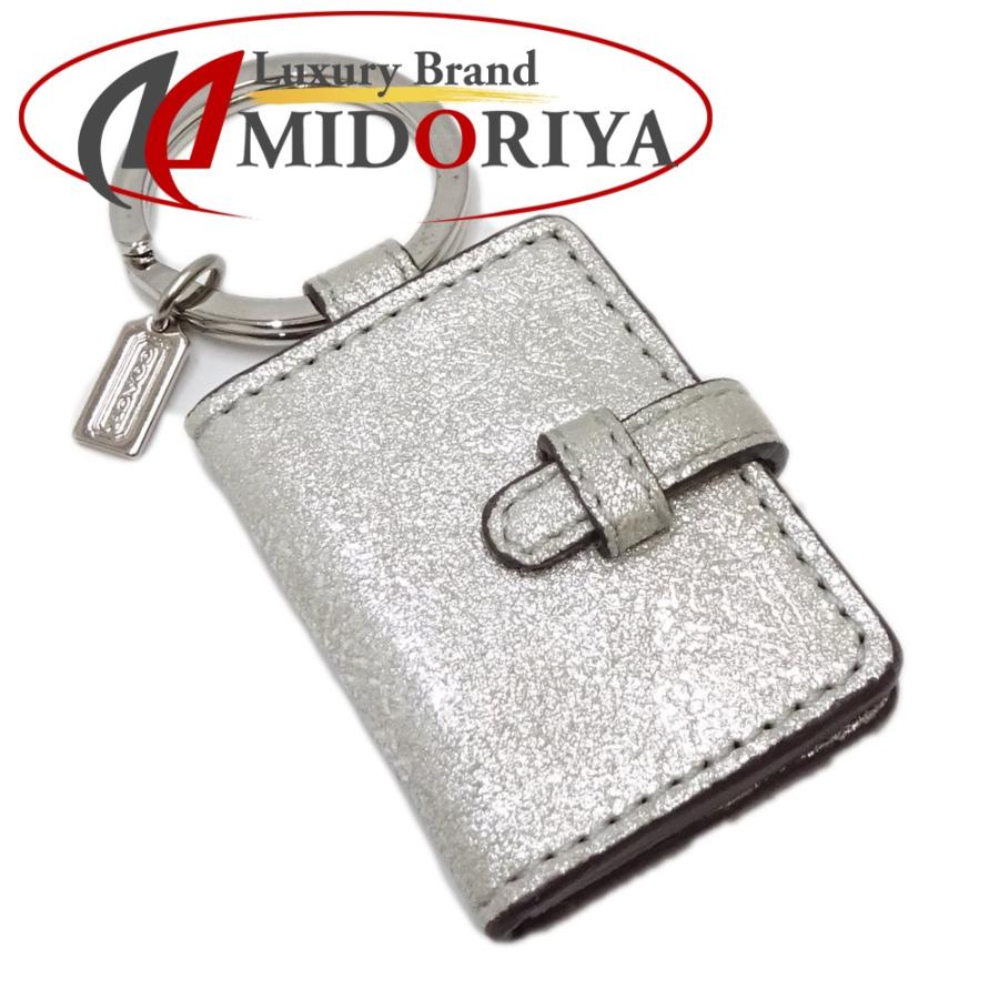 COACH（コーチ） 手帳型 バッグチャーム フォトケース スノーフレーク