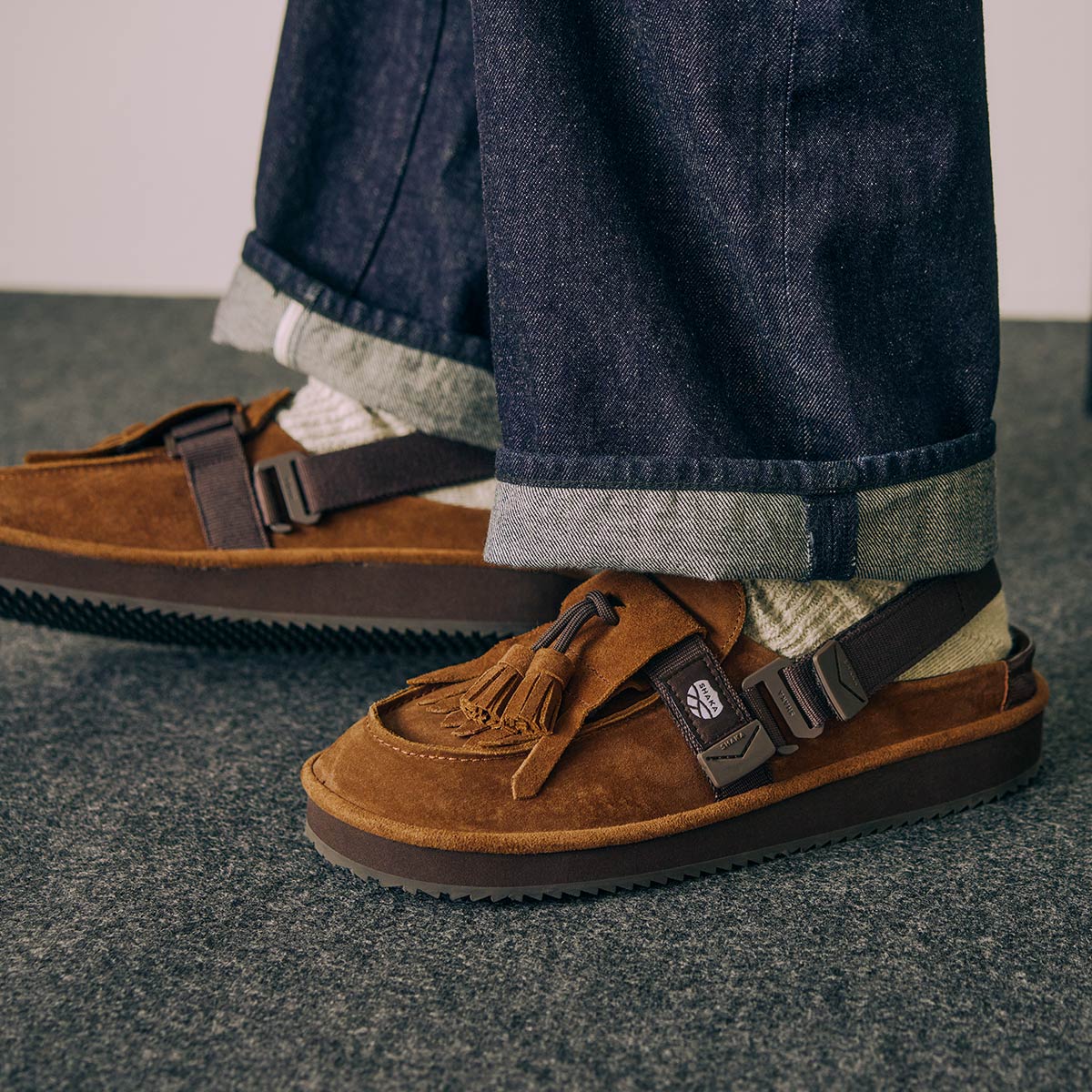 SHAKA キルトタッセル付きミュールサンダルMOC MULE TASSEL SUEDE