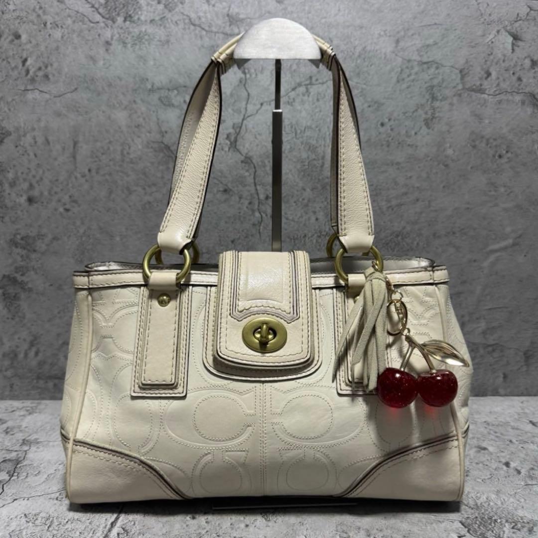 COACH Y2K Signature TurnLock Boston Bag - メルカリ