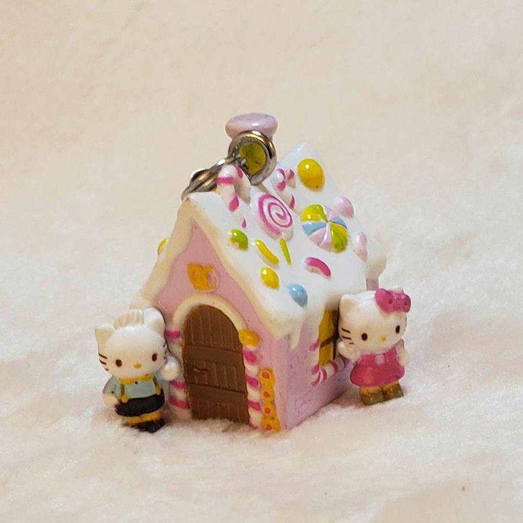 超激レア ハローキティ ダニエル お菓子の家 ストラップ - メルカリ