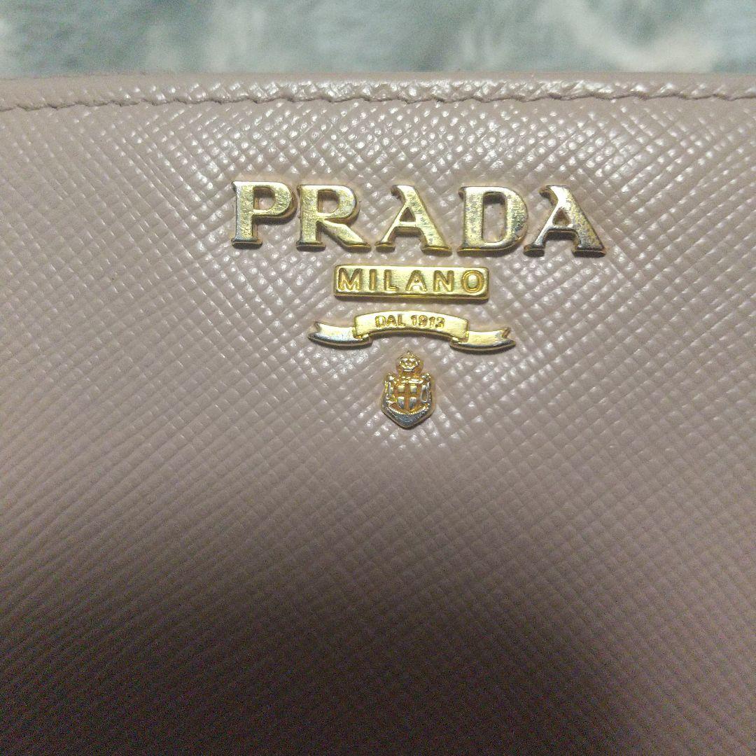 プラダPRADAサフィアーノラウンドファスナーベージュ系