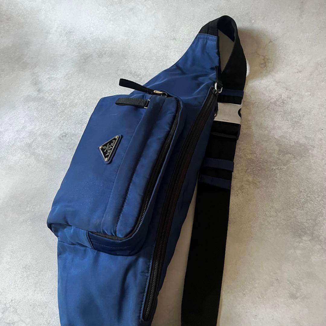 人気】PRADA ウエストバッグ 2VL005 三角ロゴ ブルー ナイロン - メルカリ