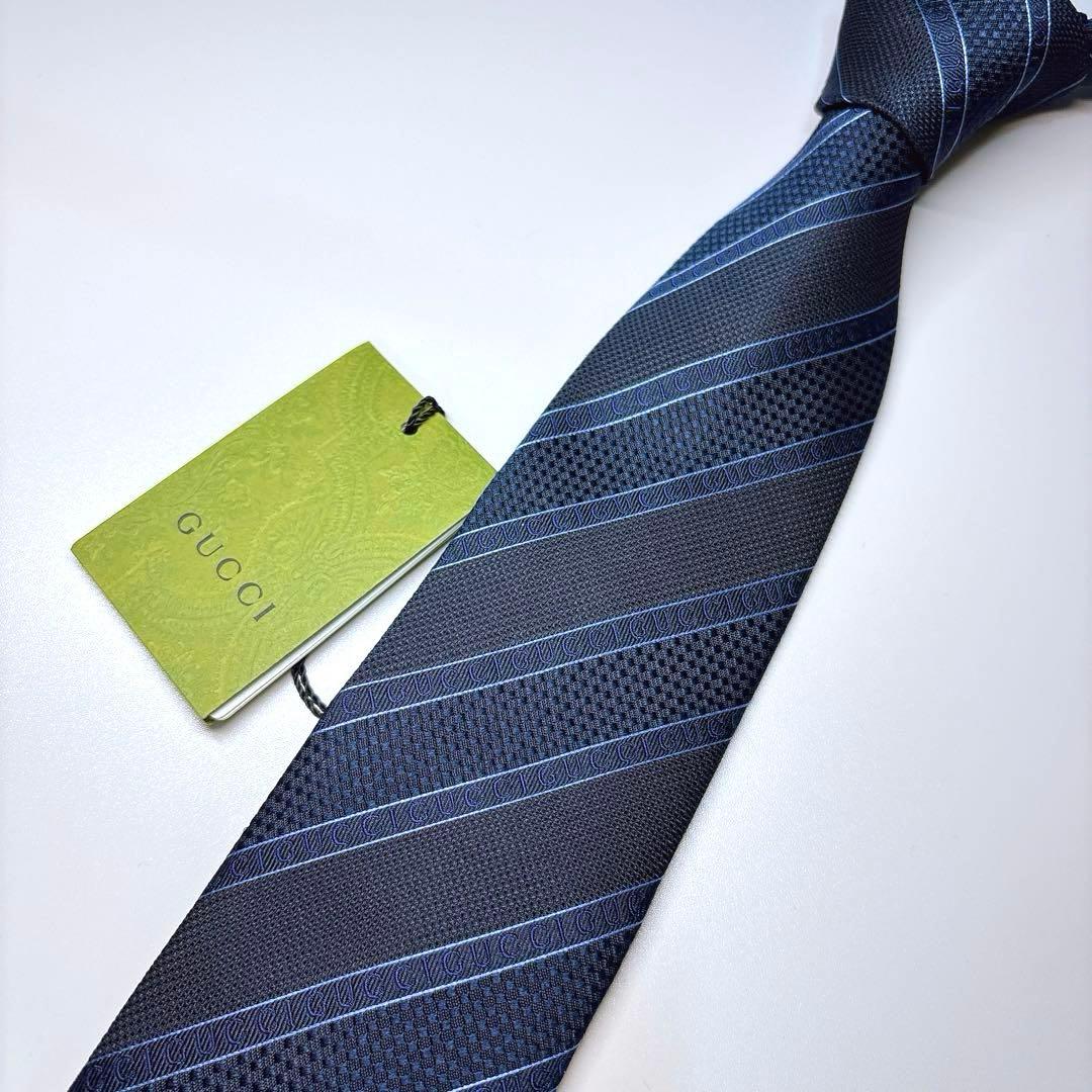 未使用 タグ付き GUCCI シルク ネクタイ レジメンタル ロゴ入り ネイビー