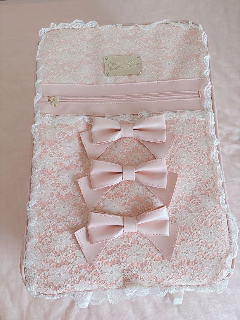 LIZ LISAピンク キャリーケース 値下げ】Liz Lisa ピンク リボン付きキャリーケース - メルカリ