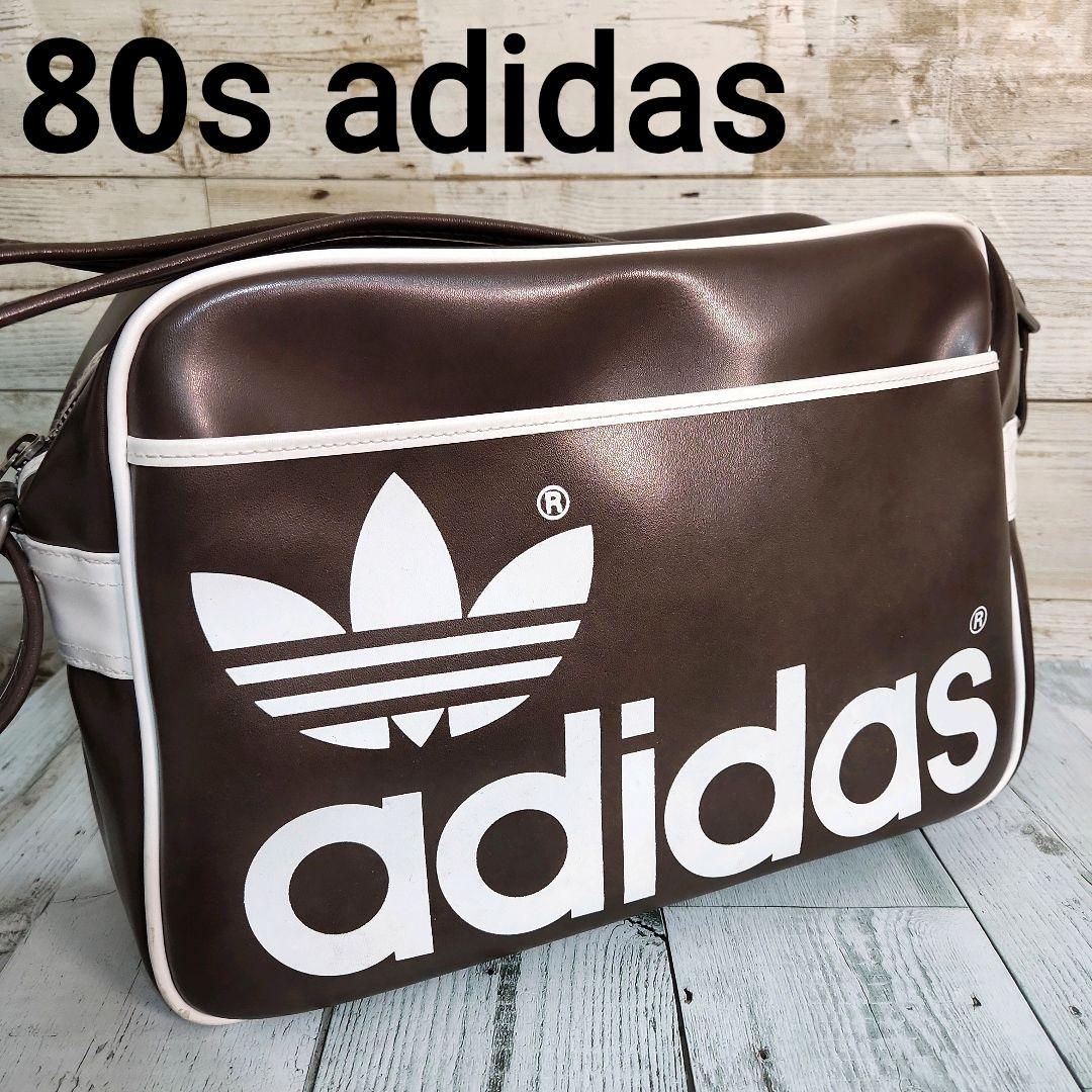 アディダス 80s ビンテージ バッグ エナメル 茶色 OASIS - メルカリ
