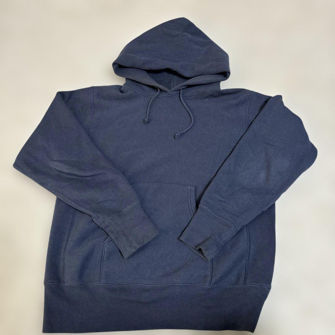 championのネイビー フード付きパーカー Lサイズ - メルカリ