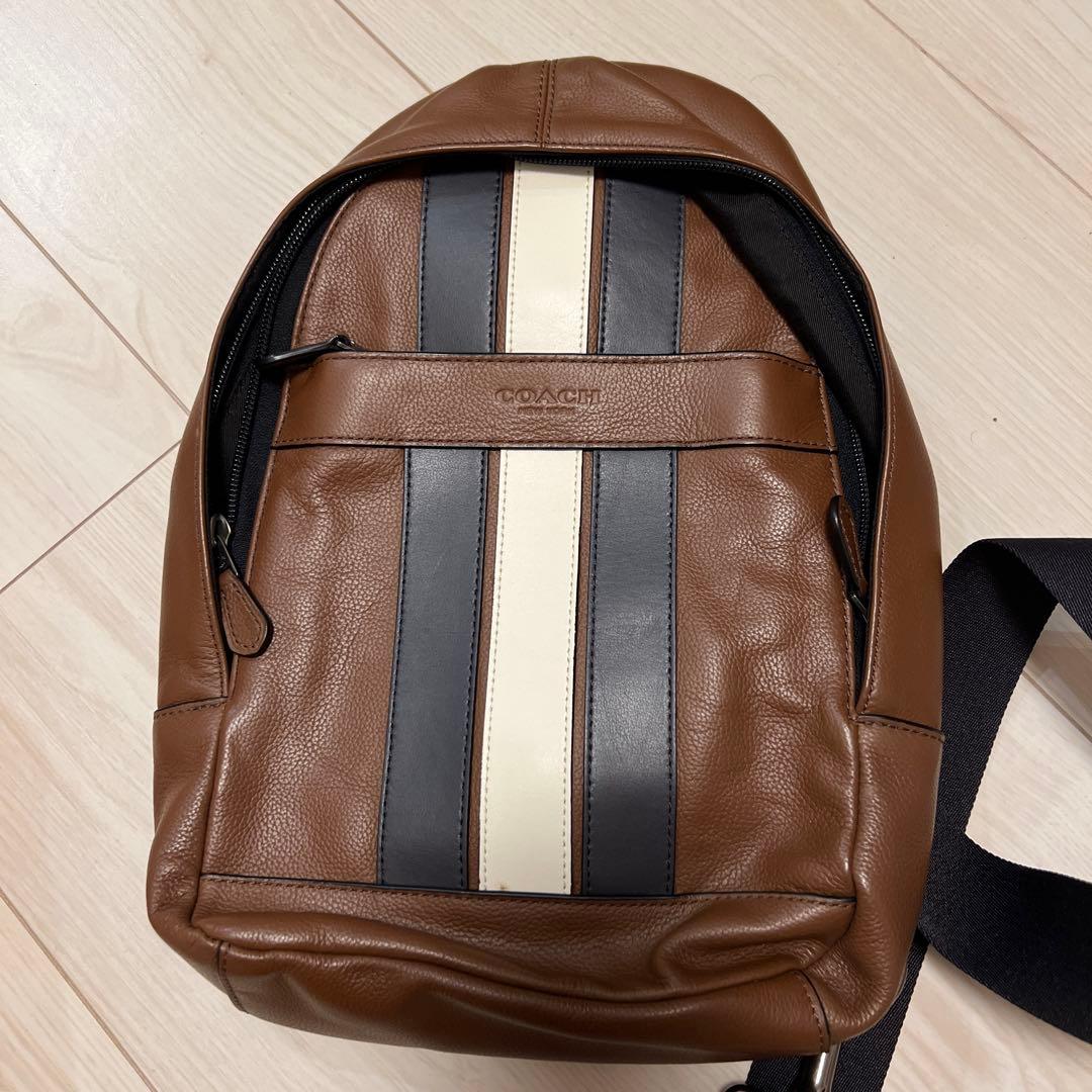 COACH ブラウンストライプボディバッグ メンズ - メルカリ
