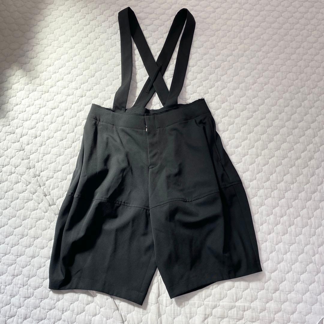 コムデギャルソン サロペット 吊り パンツ 黒 ブラック 断ち切り