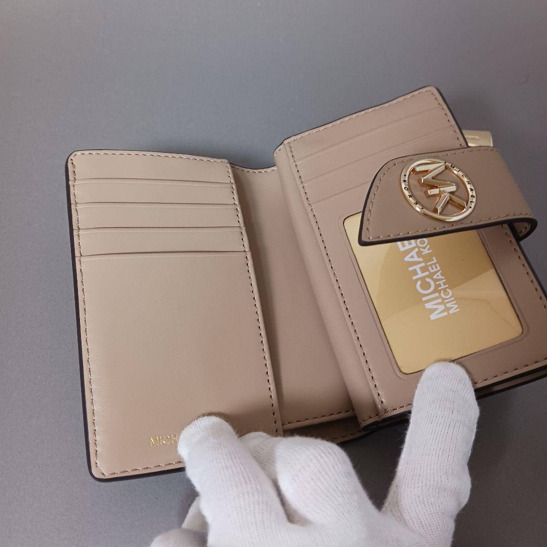 633/新品/MICHAEL KORS マイケルコース/二つ折り財布/ベージュ