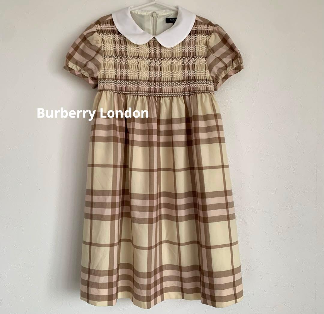 美品　Burberry バーバリーロンドン　丸襟　スモッキングワンピース　130 訳あり]BURBERRY ノバチェック 丸襟 スモッキング ワンピース 110