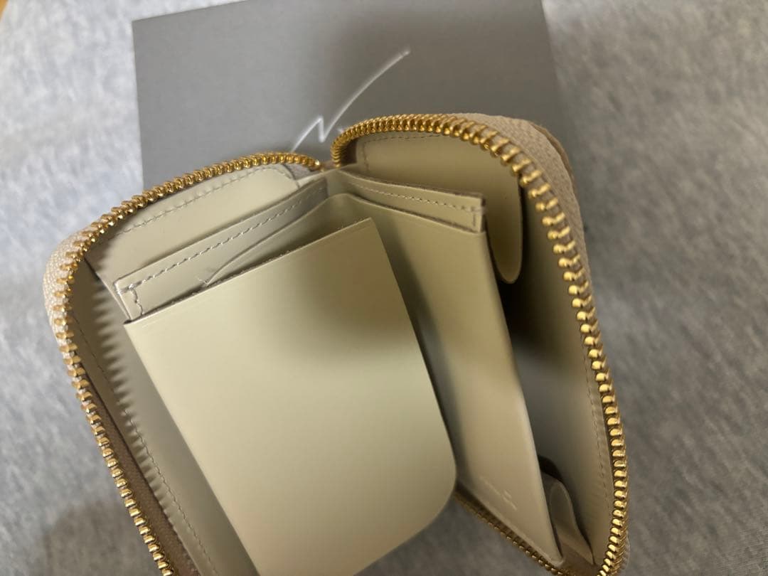 新品未使用 NADAYA mu本革 コンパクト財布 HAKU ゴールド - メルカリ