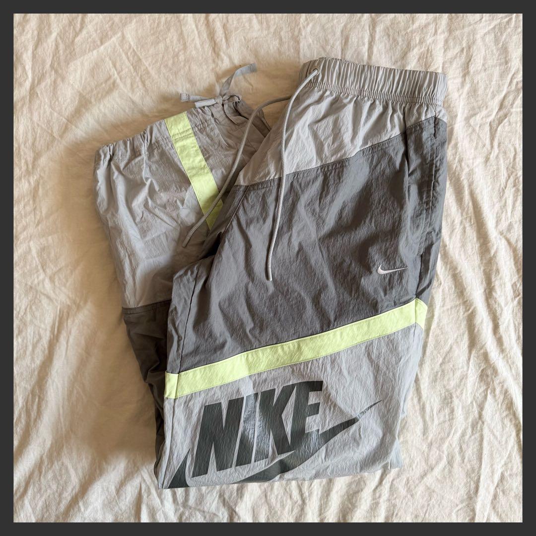 NIKE ウィメンズ ウーブン オープンヘム パンツ グレー Lサイズ - メルカリ
