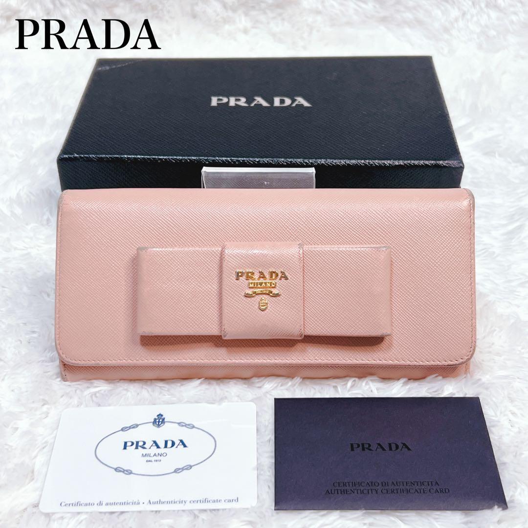 PRADA プラダ　長財布　サフィアーノ　フィオッコ　メタルロゴ　ピンク　リボン PRADA プラダ サフィアーノ リボン ラウンドファスナー 長財布