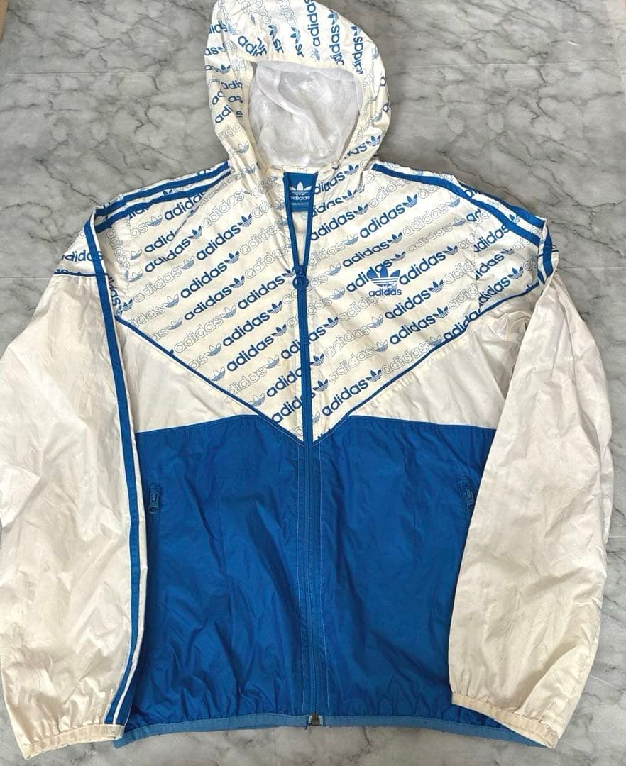 希少】アディダスオリジナルス モノグラム ウインドブレーカー V字切替
