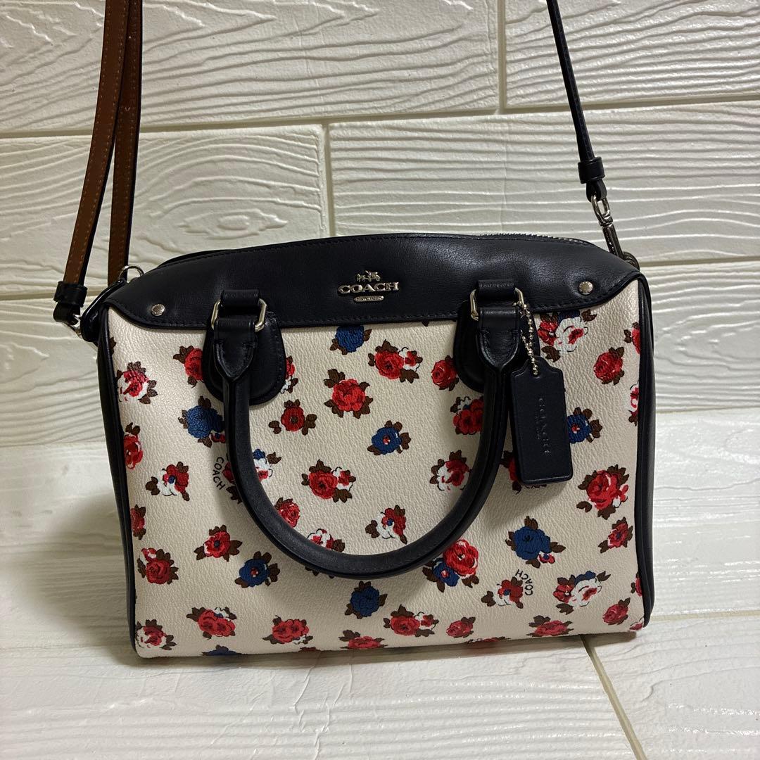 COACH フラワープリント ショルダーバッグ - メルカリ