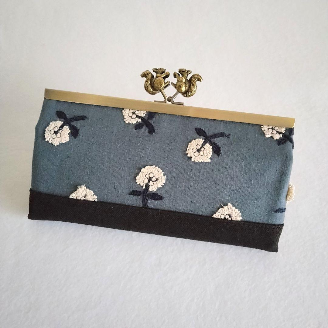 ミナペルホネン skip リス浮足がま口長財布 - メルカリ