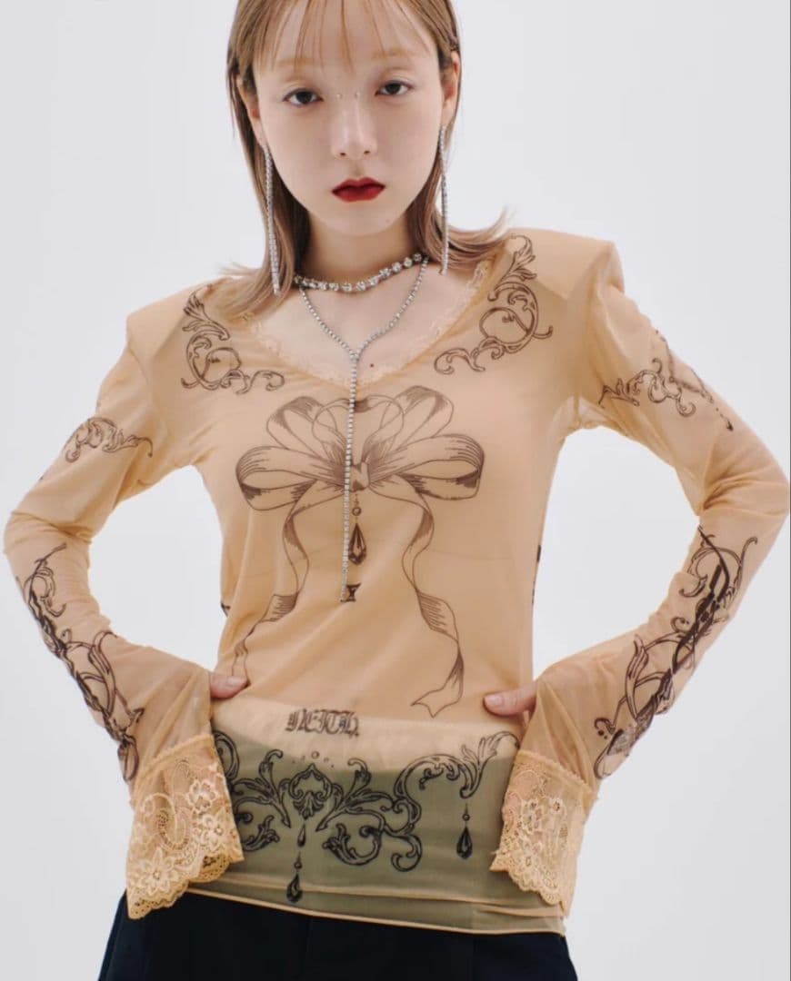 neith. タトゥーシアー メッシュ トップス - メルカリ