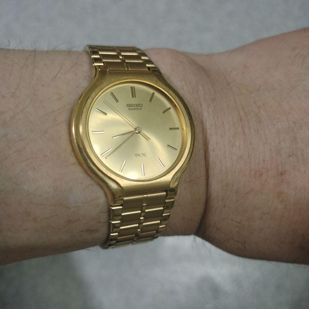 SEIKO ゴールド アナログ時計 SXクオーツ - メルカリ