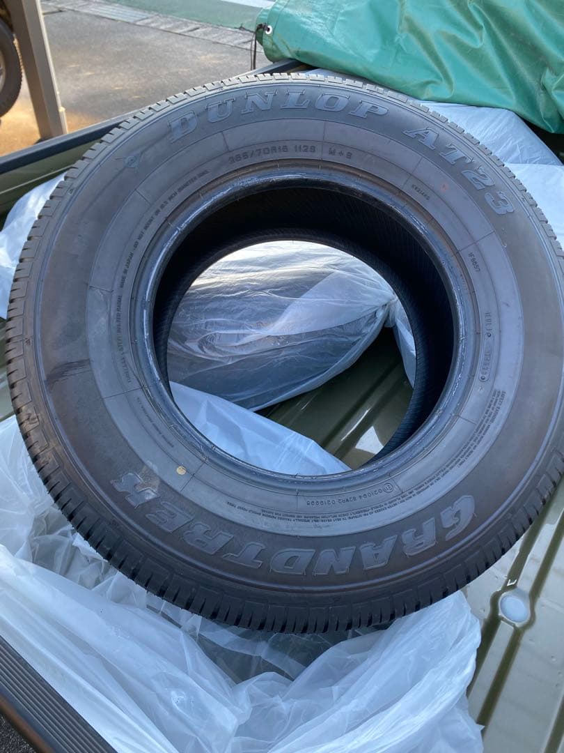 オールシーズンタイヤ　DUNLOP AT23 M+S 4本　ランクル　新車外し DUNLOP（ダンロップ） GRANDTREK AT23 265/65R18 新車装着 OEMタイヤ 4