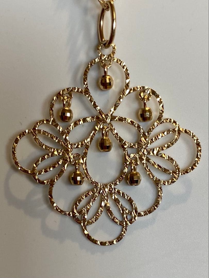 qvc 【未使用】10金　透かし　リバーシブル　ペンダントトップ オニキス リバーシブル透かし模様 サークル ペンダントトップ