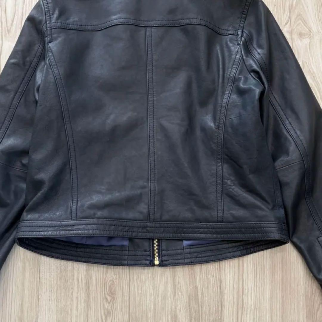美品】23AW TOMORROWLAND レザージャケット 40 ネイビー - メルカリ