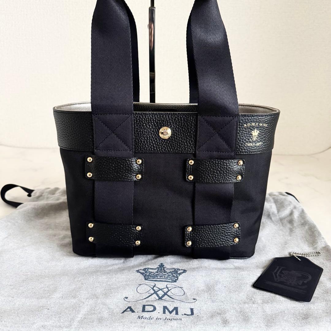 新品タグ付 近年モデル A.D.M.J デイリートートバッグ スタッズ 牛革