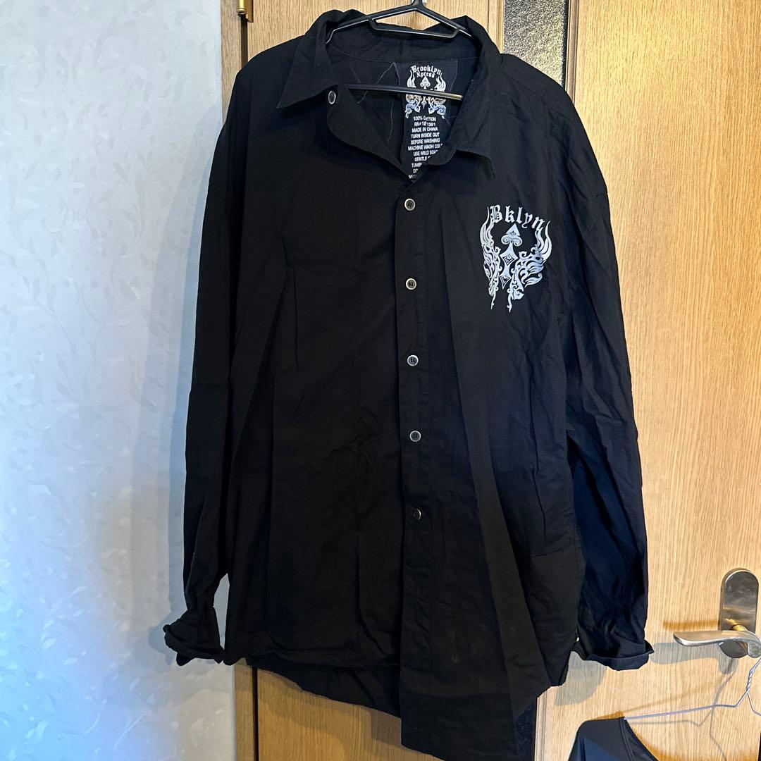 ブラック 長袖シャツ グラフィックプリント - メルカリ