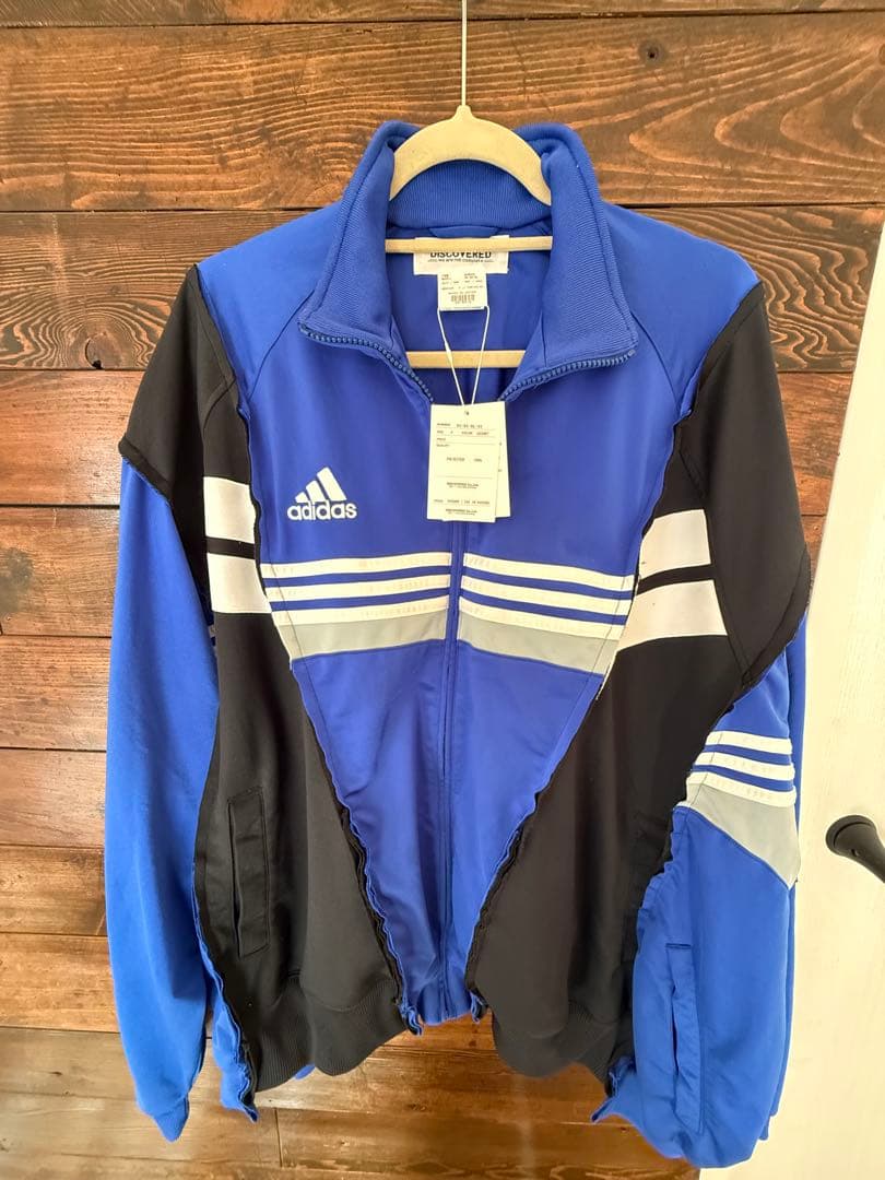 希少 DISCOVERED NEWSED 再構築 アディダス トラックジャケット