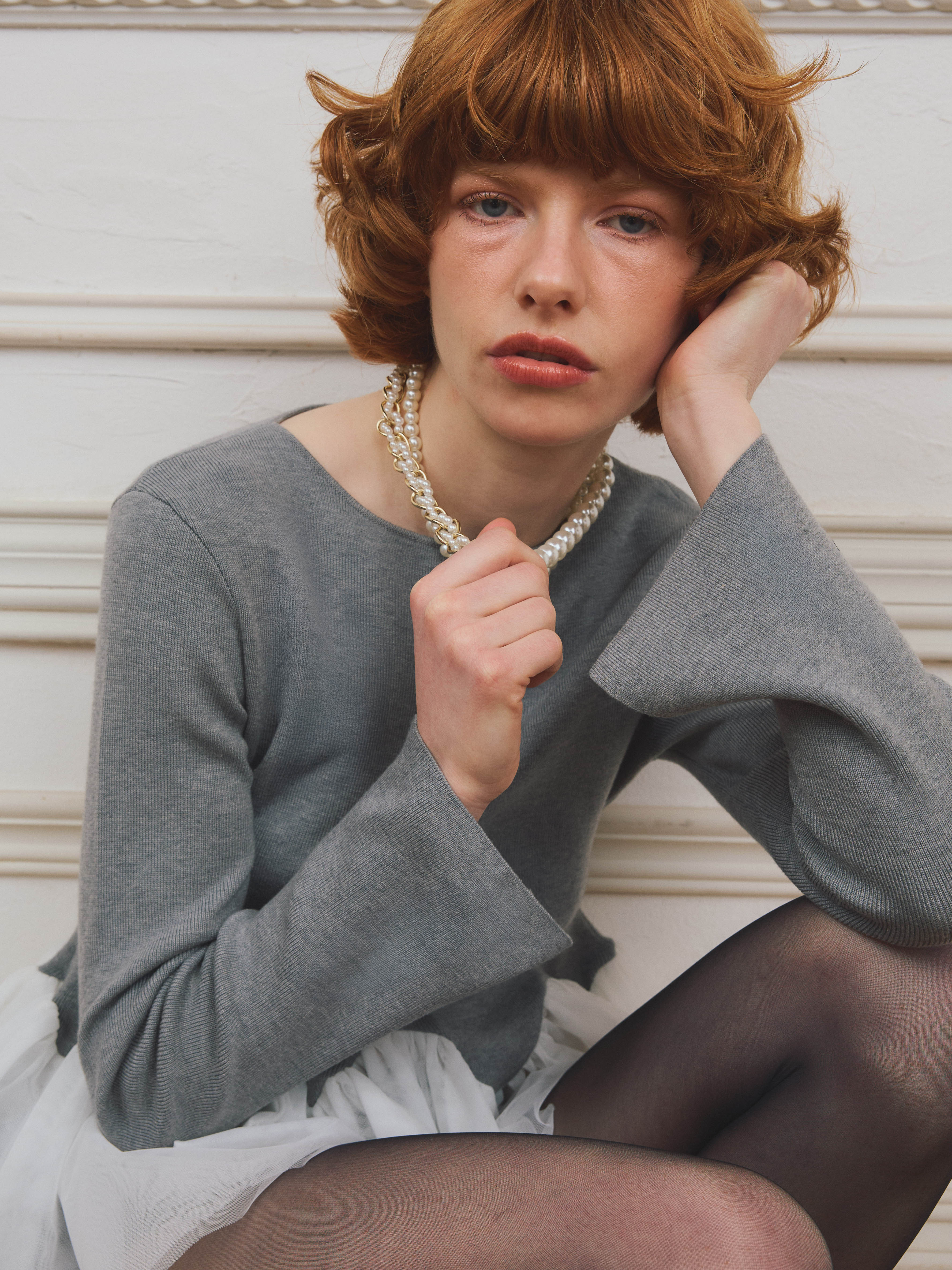 チュールペプラムニットプルオーバー