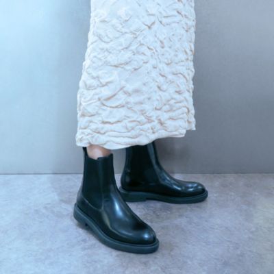 enchanted(エンチャンテッド)の【APOM】晴雨兼用・本革ウォーター